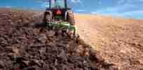 Tractor ploughing